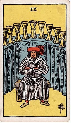 Neuf de Coupes, carte du tarot Rider-Waite-Smith