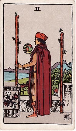 Deux de Bâtons, carte du tarot Rider-Waite-Smith